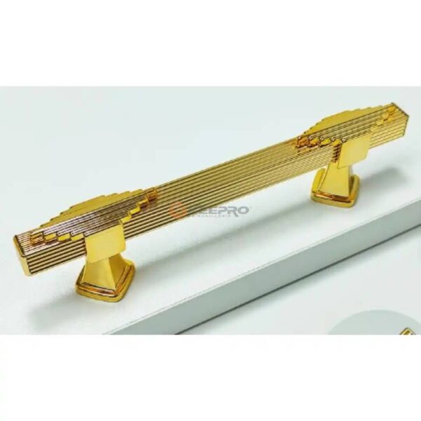 POIGNE MEUBLE COSTALE CARRE A RAYURE DORE +CRAVATE  96-150MM